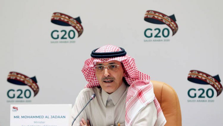 FILE PHOTO: Saudi Minister of Finance Mohammed al-Jadaan speaks during a media conference with Saudi Arabia's central bank governor Ahmed al-Kholifey, in Riyadh, Saudi Arabia, February 23, 2020. REUTERS/Ahmed Yosri/File Photo