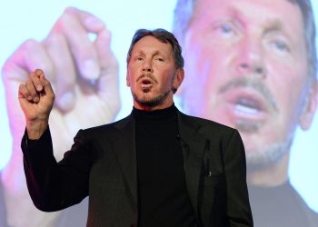 Larry Ellison, CEO of Oracle Corporation, gestures as he makes a speech during the New Economy Summit 2014 in Tokyo on April 9, 2014.  More than 1,000 business leaders, entrepreneurs, businessmen and students took part in the two-day forum.     AFP PHOTO/Toru YAMANAKA        (Photo credit should read TORU YAMANAKA/AFP/Getty Images)