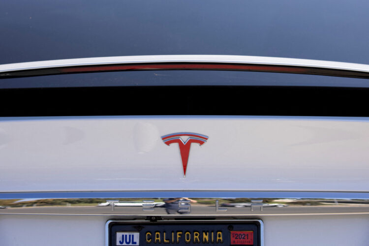 FILE PHOTO: A Tesla Model X is shown at a Tesla service center in Costa Mesa, California, U.S., October 20, 2020. REUTERS/Mike Blake/File Photo