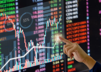 Hand businessman touch virtual screen. stock market or forex trading charts and charts with financial investment ideas