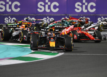 JEDDAH, SAUDI ARABIA - MARCH 09: Max Verstappen of the Netherlands driving the (1) Oracle Red Bull Racing RB20 leads the field at the start during the F1 Grand Prix of Saudi Arabia at Jeddah Corniche Circuit on March 09, 2024 in Jeddah, Saudi Arabia. (Photo by Rudy Carezzevoli/Getty Images)